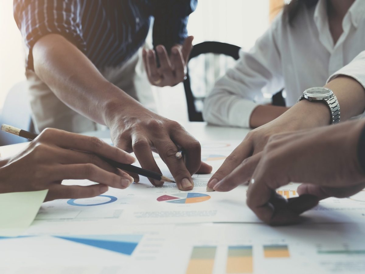 Team of business people working together in the meeting room office, teamwork background charts and graphs banner, double exposure successful teamwork,business planning concept.
